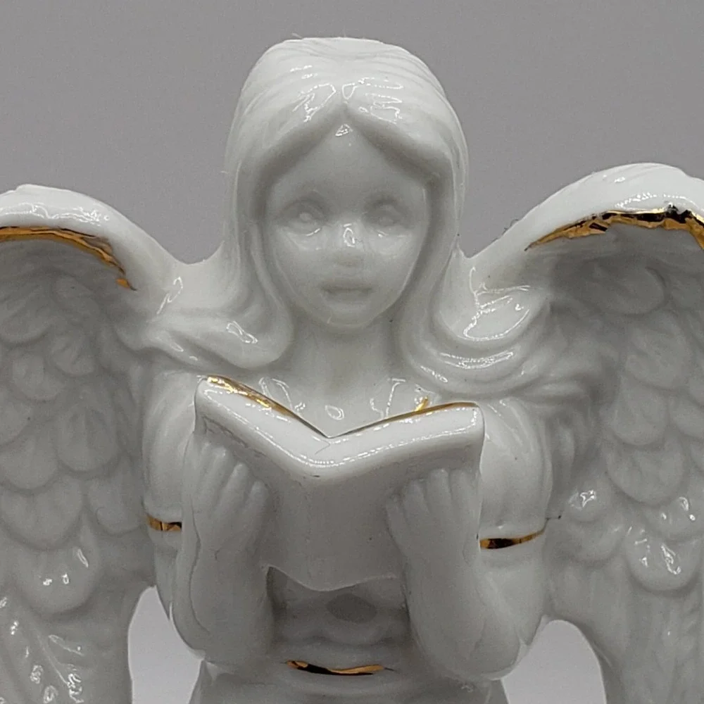 Angel Holding A Book or Hymnal Statue Figurine White Porcelain with Gold Trim